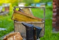 A tool of the beekeeper. Everything for a beekeeper to work with bees. Smoker, a number, a box Royalty Free Stock Photo