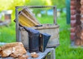 A tool of the beekeeper. Everything for a beekeeper to work with bees. Smoker, a number, a box Royalty Free Stock Photo