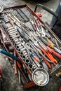 Tool box wagen. Toolset with wrenches, ring spanners, hammer, pliers, screwdrivers, monkey wrenches, screws, bolts, wire Royalty Free Stock Photo