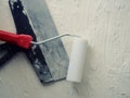 Tool for painting work. Spatula and brushes. Set of items for repair. Top view of a builder with a brush and spatula for applying