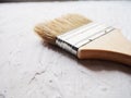 Tool for painting work. Spatula and brushes. Set of items for repair. Top view of a builder with a brush and spatula for applying