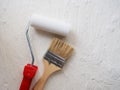 Tool for painting work. Spatula and brushes. Set of items for repair. Top view of a builder with a brush and spatula for applying