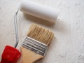 Tool for painting work. Spatula and brushes. Set of items for repair. Top view of a builder with a brush and spatula for applying