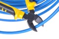 Tool pliers cutting blue cable Royalty Free Stock Photo