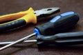 Tool set pliers yellow long screwdrivers fixation home tools electrical repair Royalty Free Stock Photo