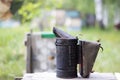 Tool for smoking bees from the hive in the apiary. Smoke for bees, equipment at the apiary. Beekeeping natural