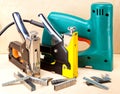 The tool - staplers electrical and manual mechanical - for repair work in the house and on furniture, and brackets