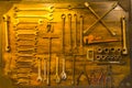 Tool storage on wooden wall in the shop