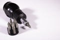 All-in-one screwdriver or screwdriver with different types of tips for screwing or unscrewing a variety of screws Royalty Free Stock Photo