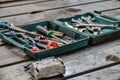 Toolbox in a locksmith shop for repairing mechanical equipment. Open-end wrenches, screwdrivers, pliers and other locksmith tools