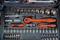 Toolbox with ratchet heads in tool store closeup