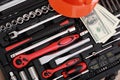 Toolbox, tools kit detail, dollar bills and orange protective helmet close up. instruments. set of tools. car tool kit. tool set