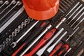 Toolbox, tools kit detail and orange protective helmet close up. instruments. set of tools. car tool kit. tool set background.