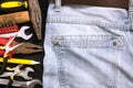 Toolkit in a blue jeans background Royalty Free Stock Photo