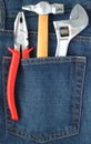 Toolkit in jeans pocket Royalty Free Stock Photo