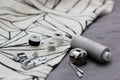 Tools and accessories for sewing on a background of linen fabric Royalty Free Stock Photo