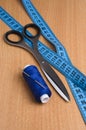 Tools and accessories for sewing. Sewing thread, scissors, tailo Royalty Free Stock Photo