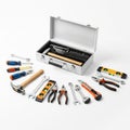 Tools is arranged on a white surface, featuring an open metal Royalty Free Stock Photo