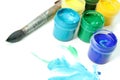 Tools of the artist: paints, brush and a paper Royalty Free Stock Photo