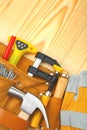 Tools in belt on wooden boards Royalty Free Stock Photo