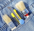 Brush and knife in pocket Royalty Free Stock Photo