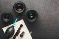 Tools for cleaning the camera with lenses on a dark textured background Royalty Free Stock Photo