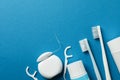 Tools for dental care on blue background