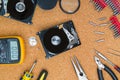 Disassembled hard drive and tools Royalty Free Stock Photo