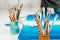 Tools and equipment for the artist. Palette and brushes close-up. The process of drawing and creativity. The picture is Royalty Free Stock Photo