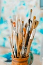 Tools and equipment for the artist. Palette and brushes close-up. The process of drawing and creativity. The picture is Royalty Free Stock Photo