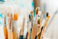 Tools and equipment for the artist. Palette and brushes close-up. The process of drawing and creativity. The picture is Royalty Free Stock Photo