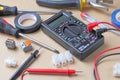 Tools and equipment of an electrical engineer or professional worker on a craft background, place for text Royalty Free Stock Photo
