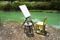 Tools and equipments easel drawing and canvas painting beside lake pond for thai people artist sketching drafts image in garden