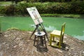Tools and equipments easel drawing and canvas painting beside lake pond for thai people artist sketching drafts image in garden