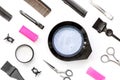 Tools for hair dye and hairdye top view white background Royalty Free Stock Photo