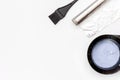 Tools for hair dye and hairdye top view white background Royalty Free Stock Photo