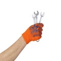 Tools hands action - Hand in working glove holds spanners. Isolated Royalty Free Stock Photo