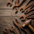 Tools, including wrenches, pliers, and a hammer, is arranged Royalty Free Stock Photo