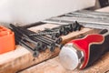 Tools for the job. Screws, nails and a screwdriver are on the table. carpentry tools