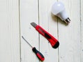 tools, light bulb, knife, screwdriver