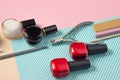 Tools for manicure on a blue background. Nail files, scissors and nail polishes top view. Nail Salon, Beauty Salon