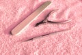 Tools manicure set in a pink towel, beauty and care of hands