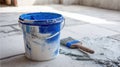Tools and Materials Ready for Tile Installation on Construction Site With Visible Adhesive and Paintbrush Royalty Free Stock Photo