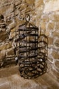 Tools of the Middle Ages for torture. Hanging metal cage Royalty Free Stock Photo