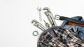 Tools near checkered shirt, jeans, leather belt top view. men`s hobby flat lay Royalty Free Stock Photo