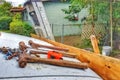 Tools are not needed during a break on the construction jobÃ¢âÂª three hammers rest on top of a white truck hood Royalty Free Stock Photo