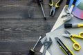 Tools for repairing on grey wooden desk background top view copyspace Royalty Free Stock Photo