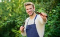 Tools for roasting meat outdoors. Barbeque party. Cooking burgers. Picnic concept. Bbq chef. Handsome guy cooking food Royalty Free Stock Photo