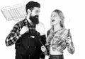 Tools for roasting meat outdoors. Picnic and barbecue. Man bearded hipster and girl ready for barbecue party. Culinary Royalty Free Stock Photo