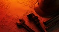 Tools and safety equipment rest on a blueprint Royalty Free Stock Photo